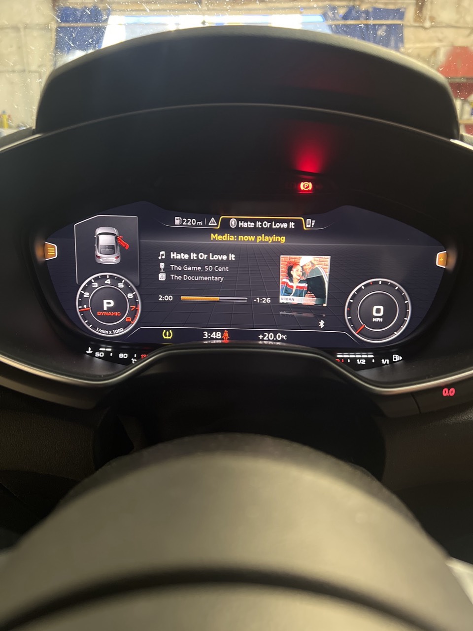 A digital Audi dashboard instrument cluster powered up and working after electrical work at Samet Auto Electrics.